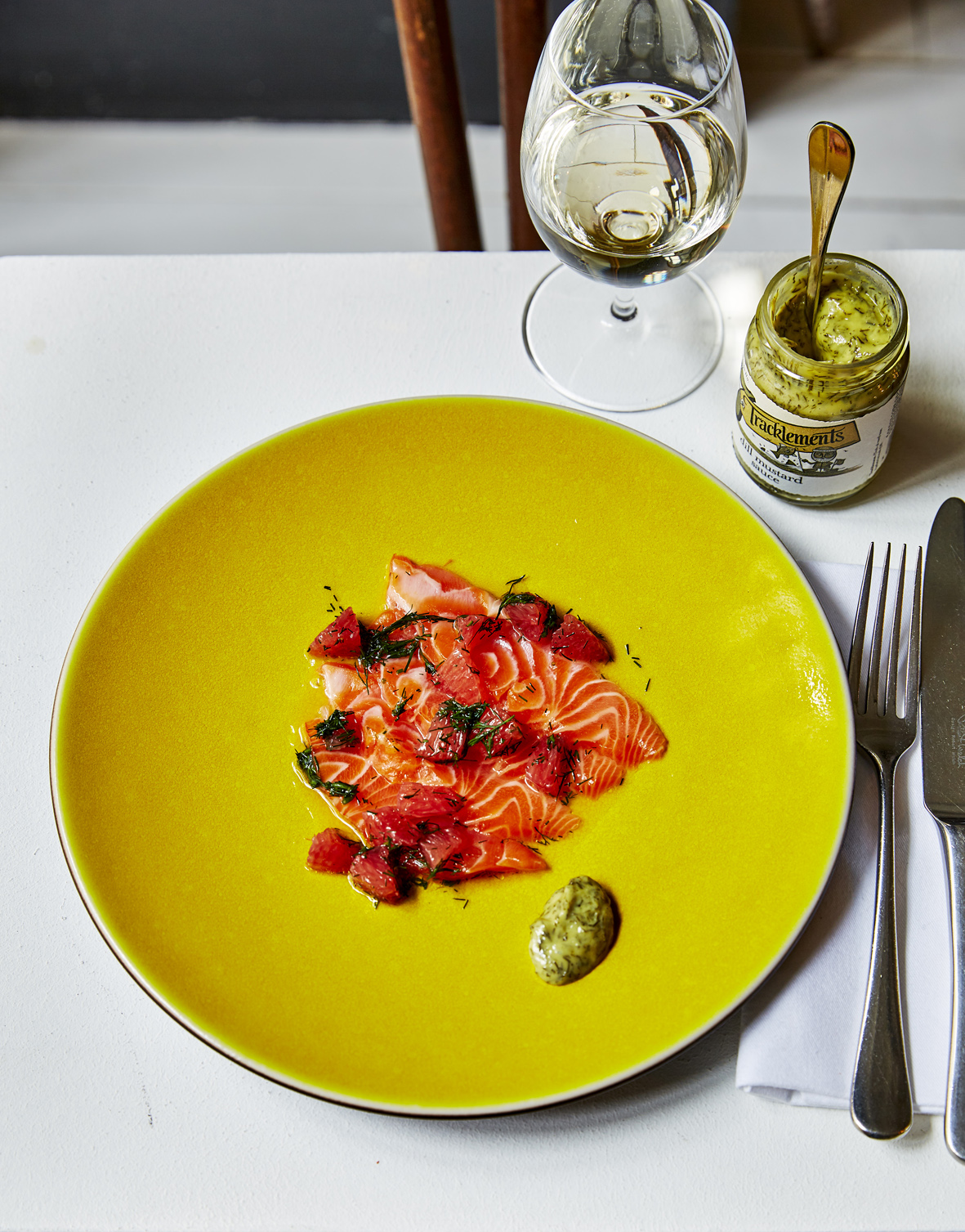 Dill with marinated sea trout and grapefruit